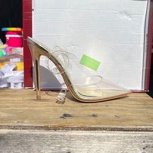 Nude clear strap show with gold accents